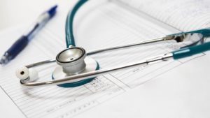 stethoscope on a set of files