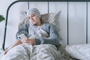 woman in bed with iv